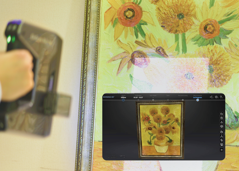 Scanning a textured painting with the EinScan Pro HD to capture fine surface detail for digital archiving.