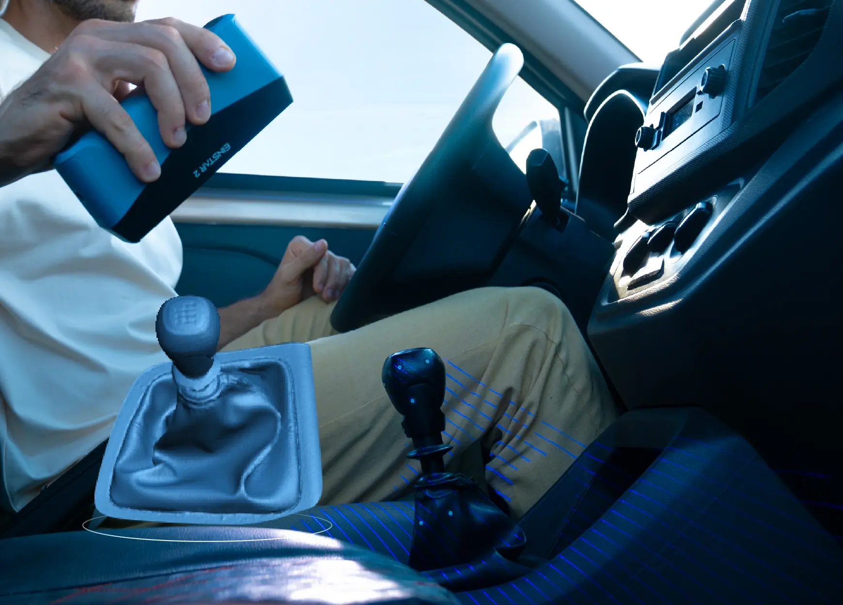 EINSTAR 2 scanning a car’s gear shifter without spray, demonstrating its ability to capture reflective black surfaces directly.