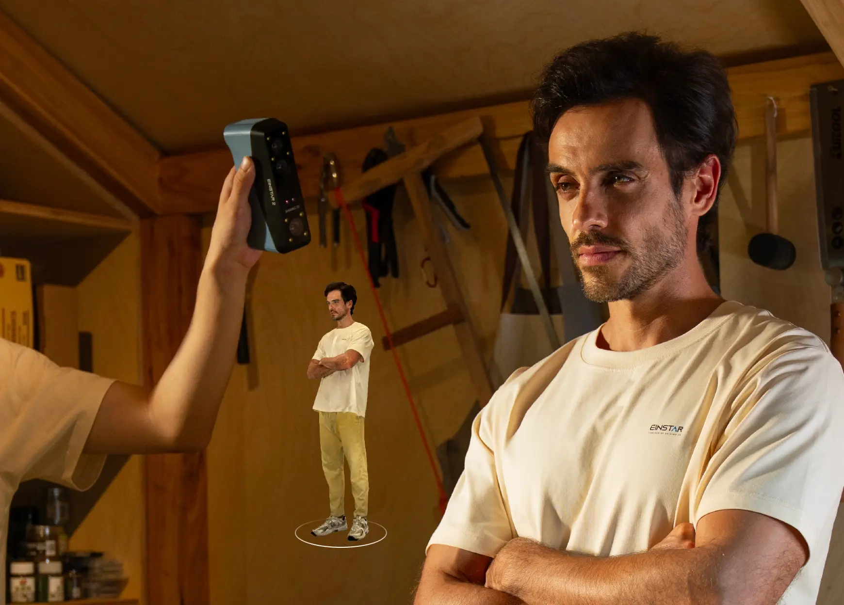 EINSTAR 2 being used to scan a person’s face and body, with a miniature 3D model preview shown alongside.