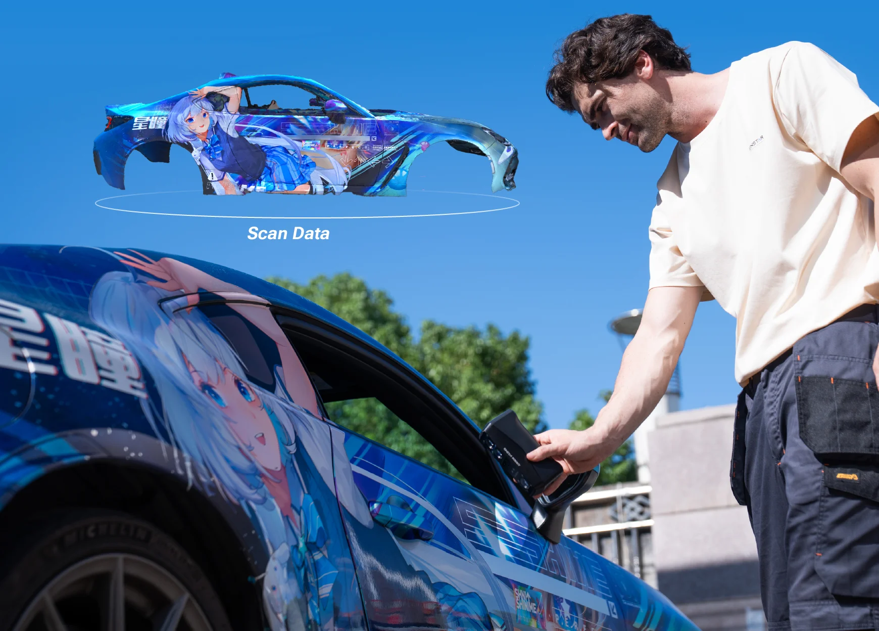 EINSTAR Rockit scanning an anime-themed car wrap outdoors in bright daylight, with the full-colour 3D scan data shown above.