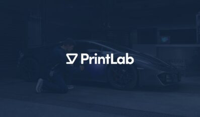 PrintLab logo displayed over an automotive 3D scanning workflow in a workshop.
